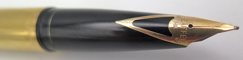 ITEM #6591 6592: SHEAFFER SOLID BRASS DESK SET WITH ONYX MARBLE CRAFTED BY GIBSON. FOUNTIAN PEN IS GOLD FILLED IMPERIAL SQUEEZE FILLER. INLAID 14K NIB IN BROAD. Pen has good flow and writes super smooth.